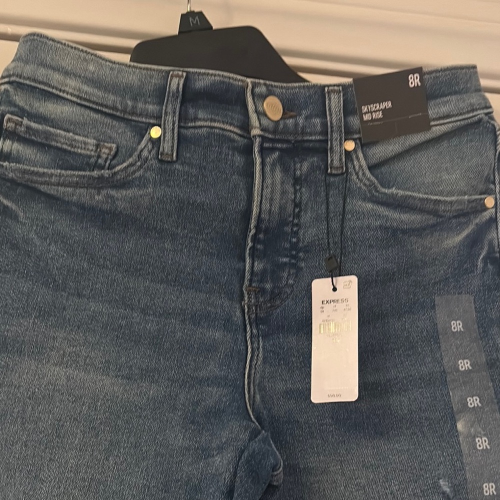 Express High Rise Blue Jeans with Vintage-Inspired Wash
